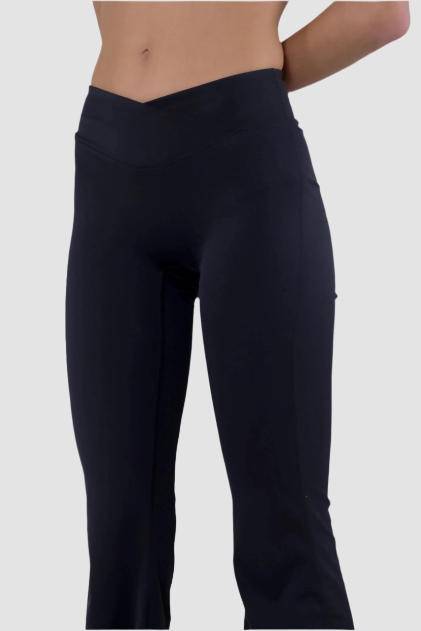 Angled front view of black Aivvia Athletics high-rise flare yoga pants, women’s bootcut fitness bottoms.
