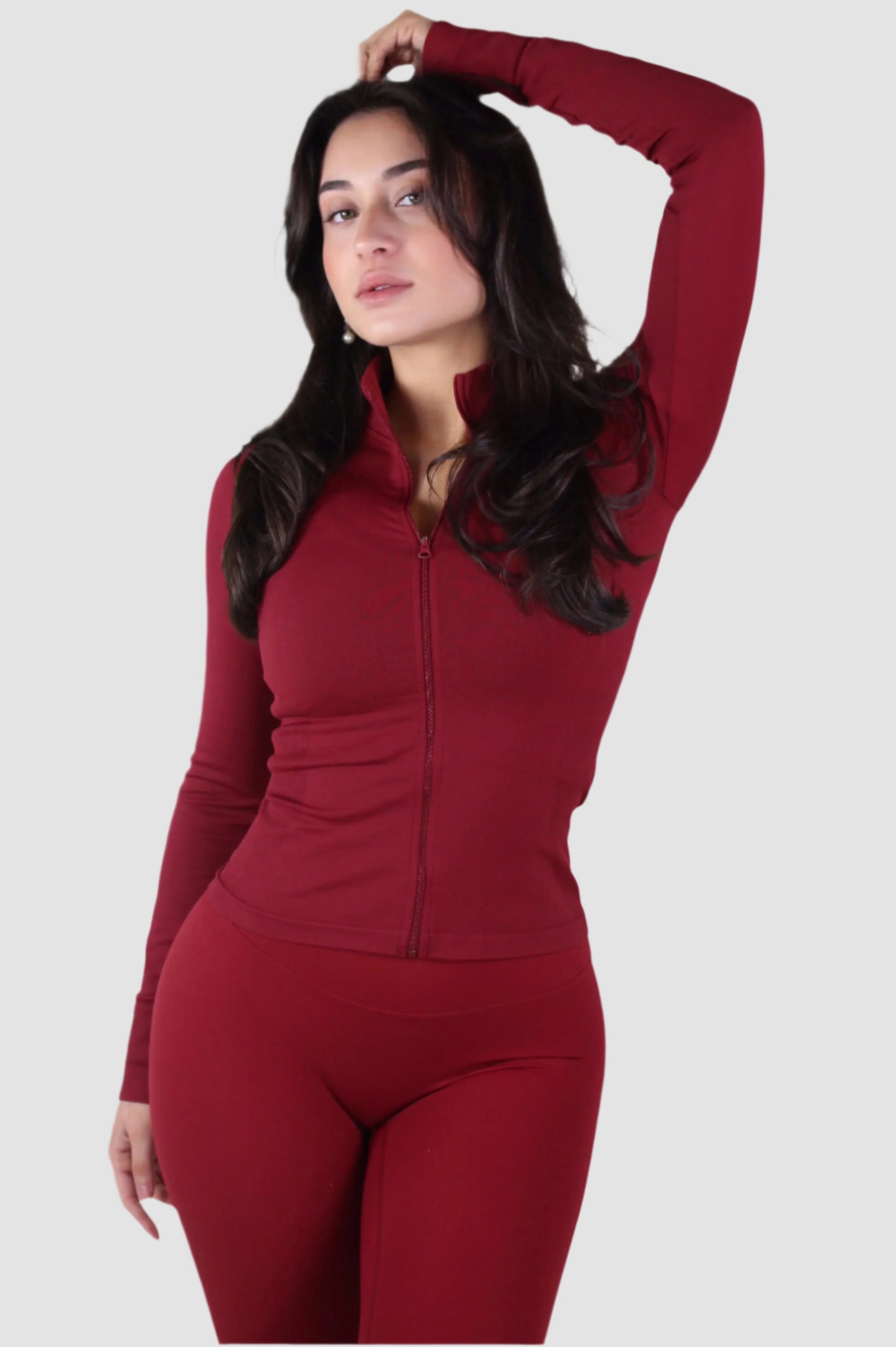 Full-body view of red Aivvia Athletics leggings, versatile women’s activewear for training or lounging.