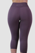 Purple leggings with 'AIVVIA' branding on a light gray background