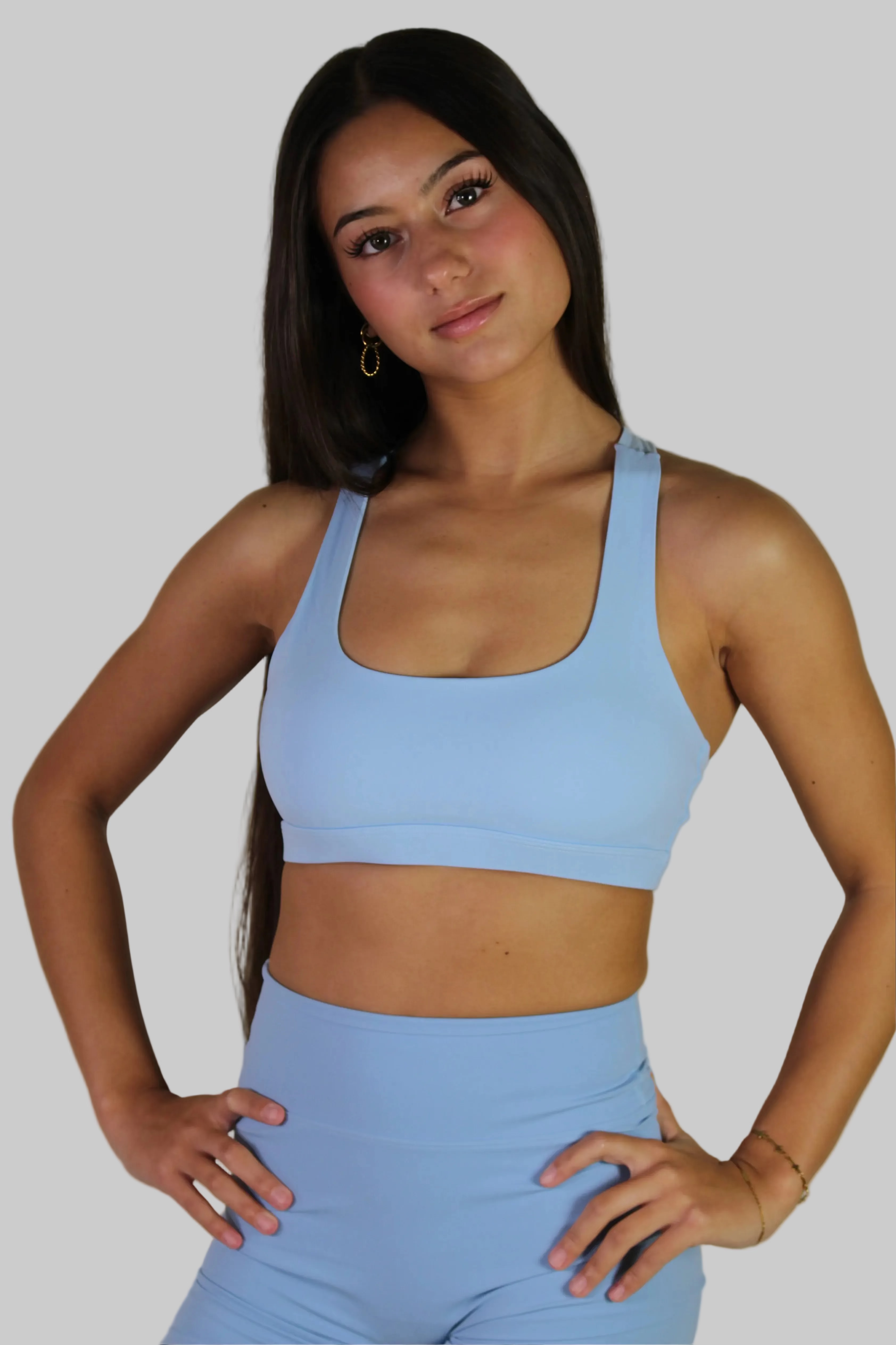 Front view of AIVVIA Athletics BERRY BRA in berry — women's sculpting sports bra designed for gym training, yoga, Pilates and everyday athleisure wear