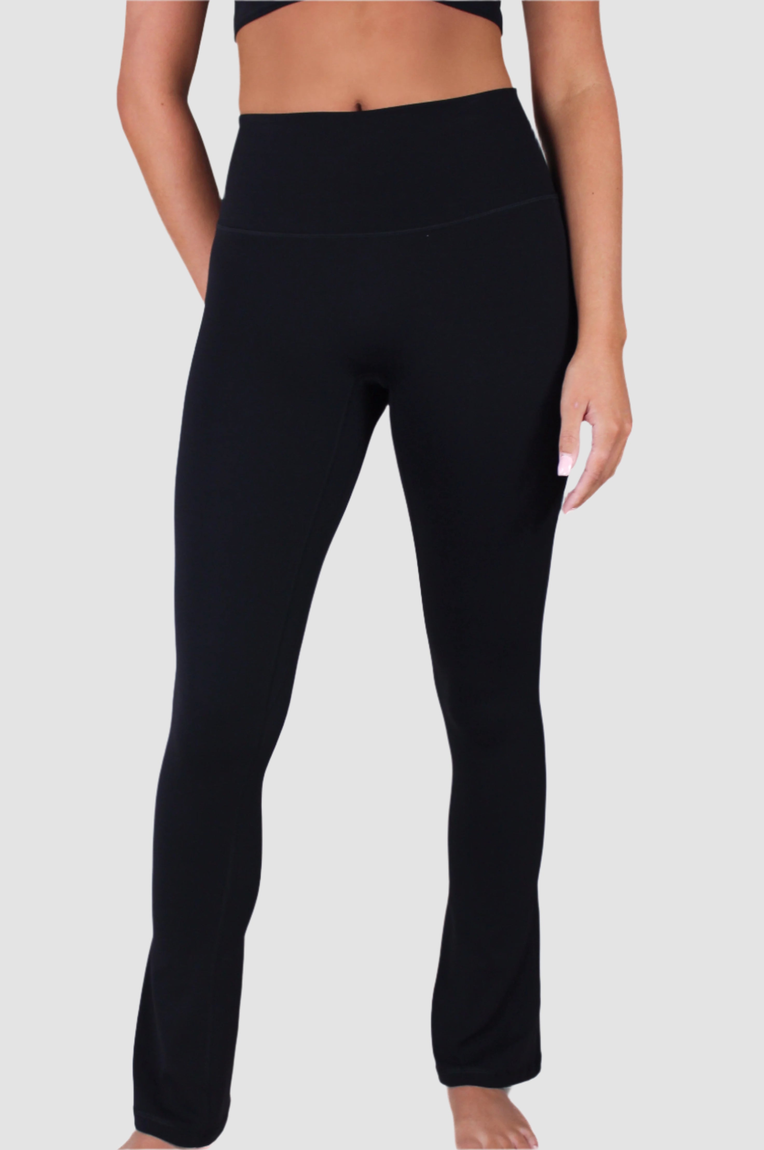 Front view of black Aivvia Athletics high-waisted flare pants with smooth finish and full length.