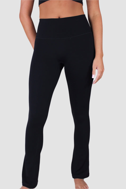 Front view of black Aivvia Athletics high-waisted flare pants with smooth finish and full length.