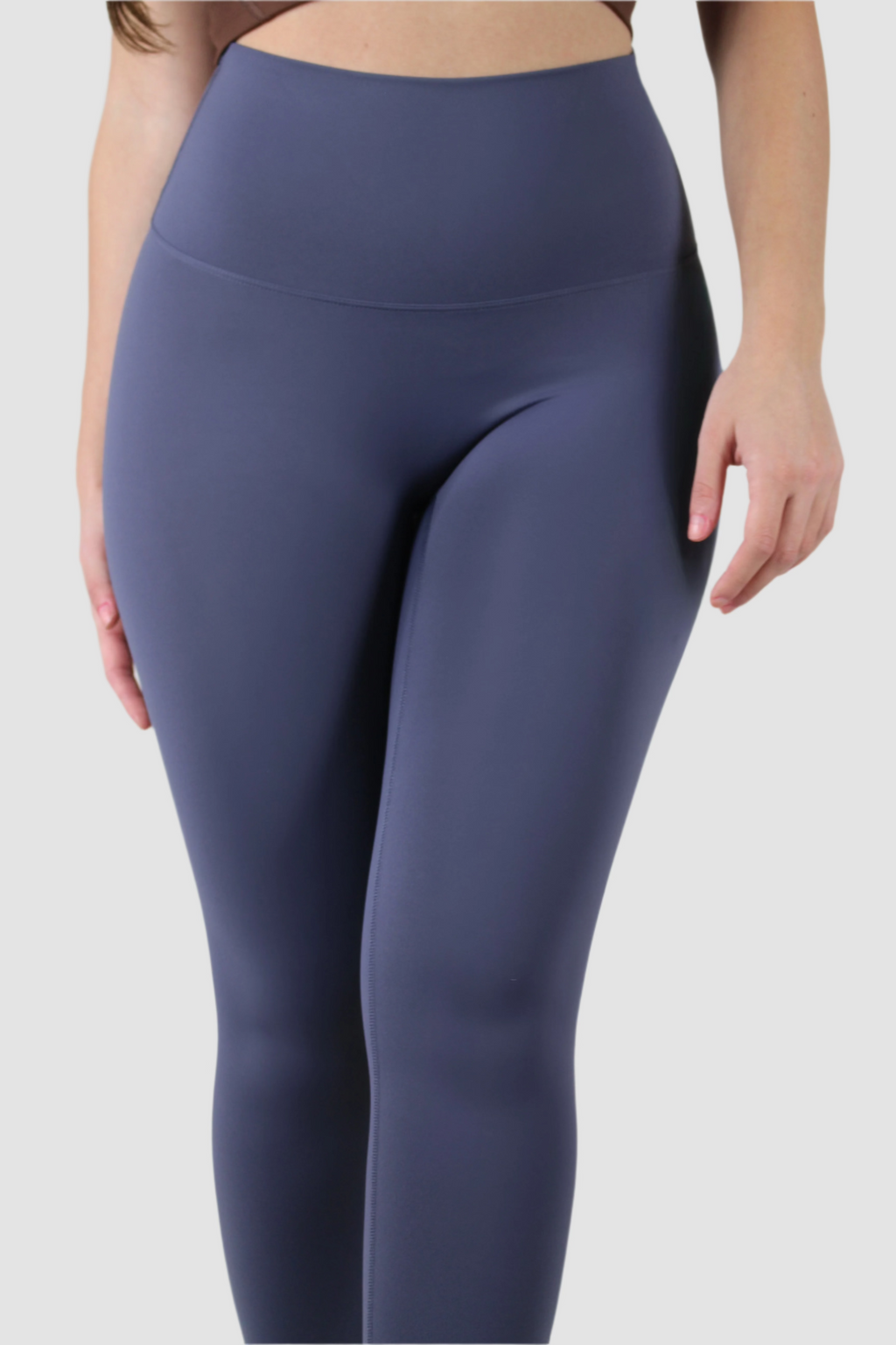 Navy Aivvia Athletics high-rise leggings, women’s workout tights for running, Pilates, and active lifestyle.