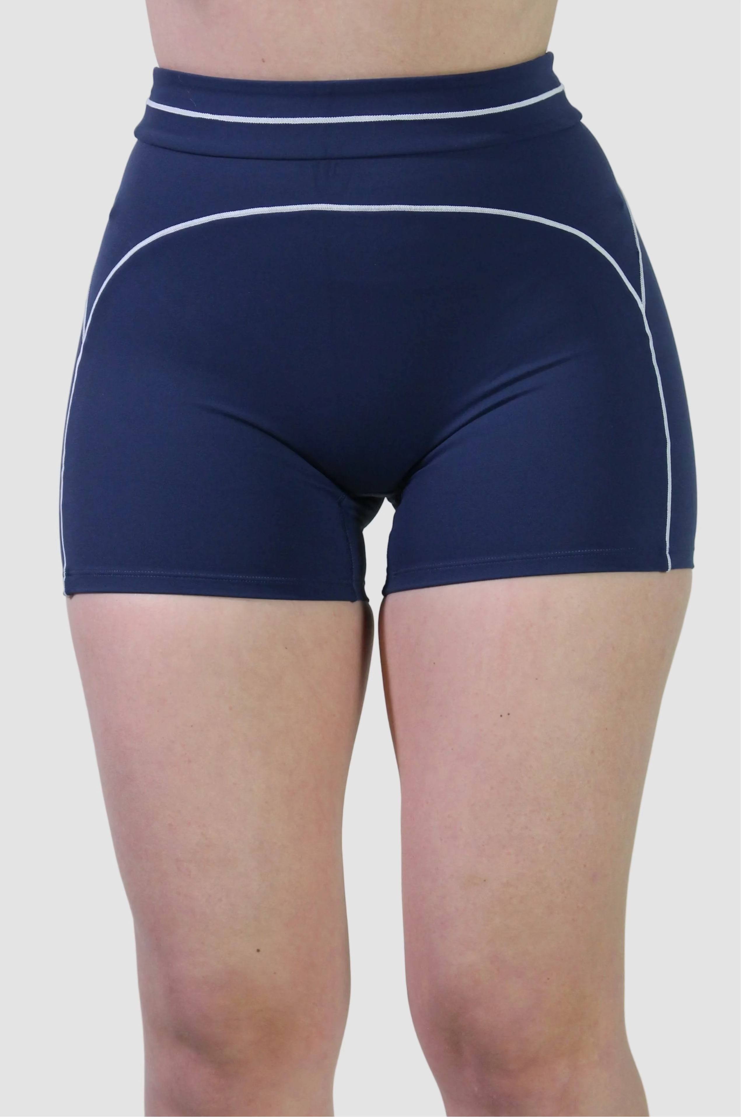 Front view of the Midnight Navy Sculpt Shorts showing the secure waistband and mid-thigh length coverage.