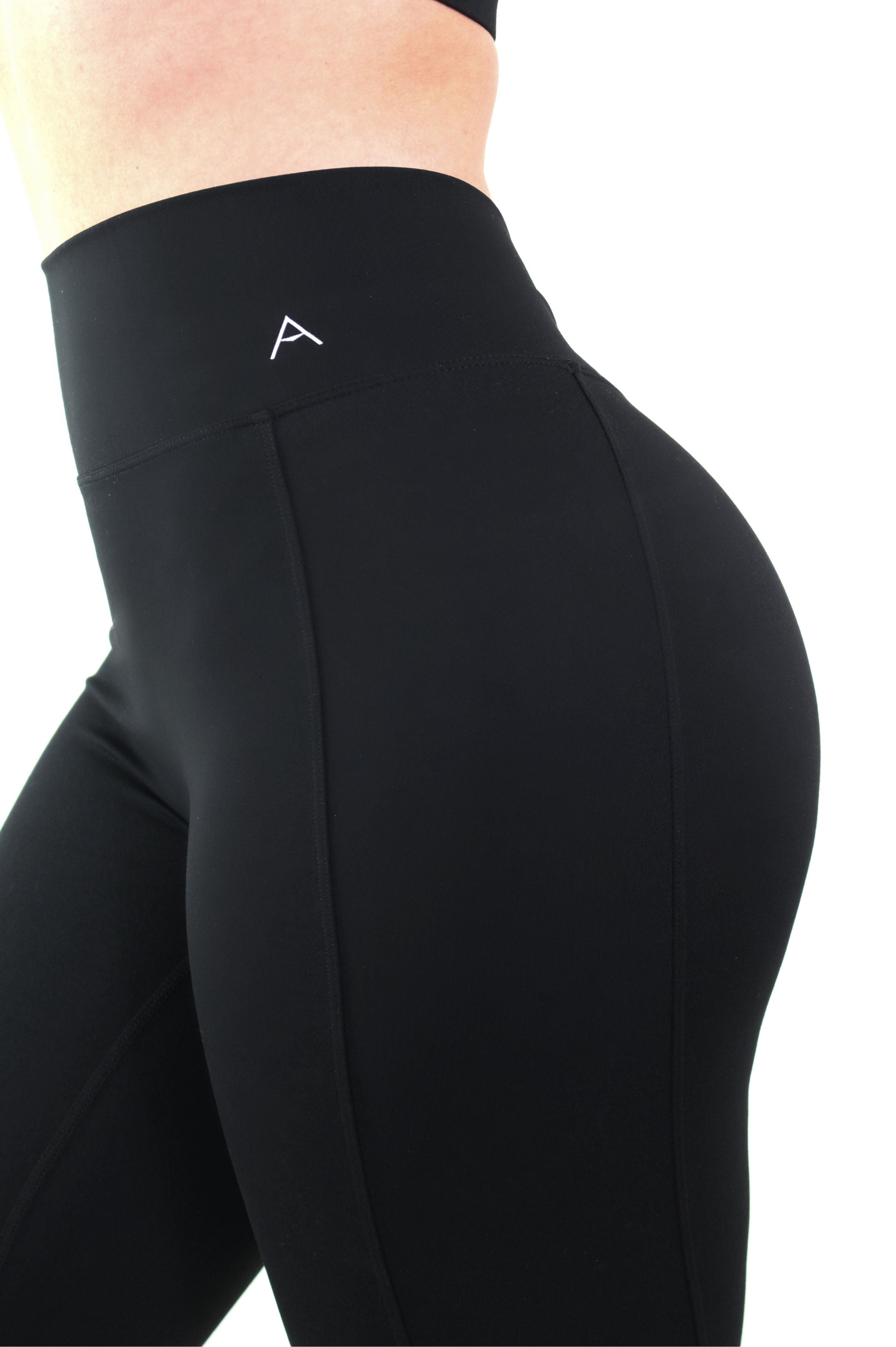 Black leggings with a logo on a white background