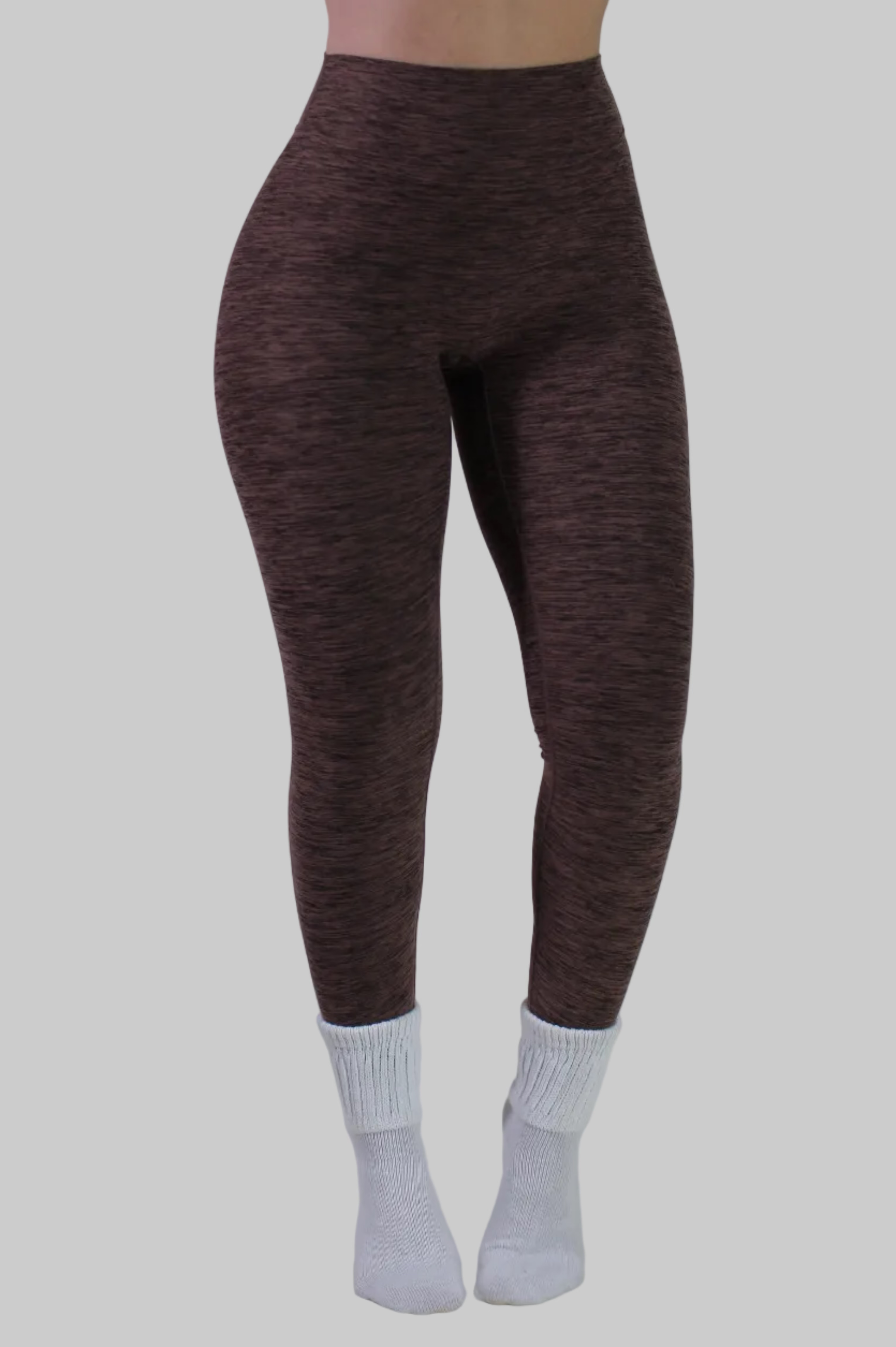 Front-facing view of the Aivvia Athletics espresso leggings highlighting the clean front panel and secure, flat-laying waistband.