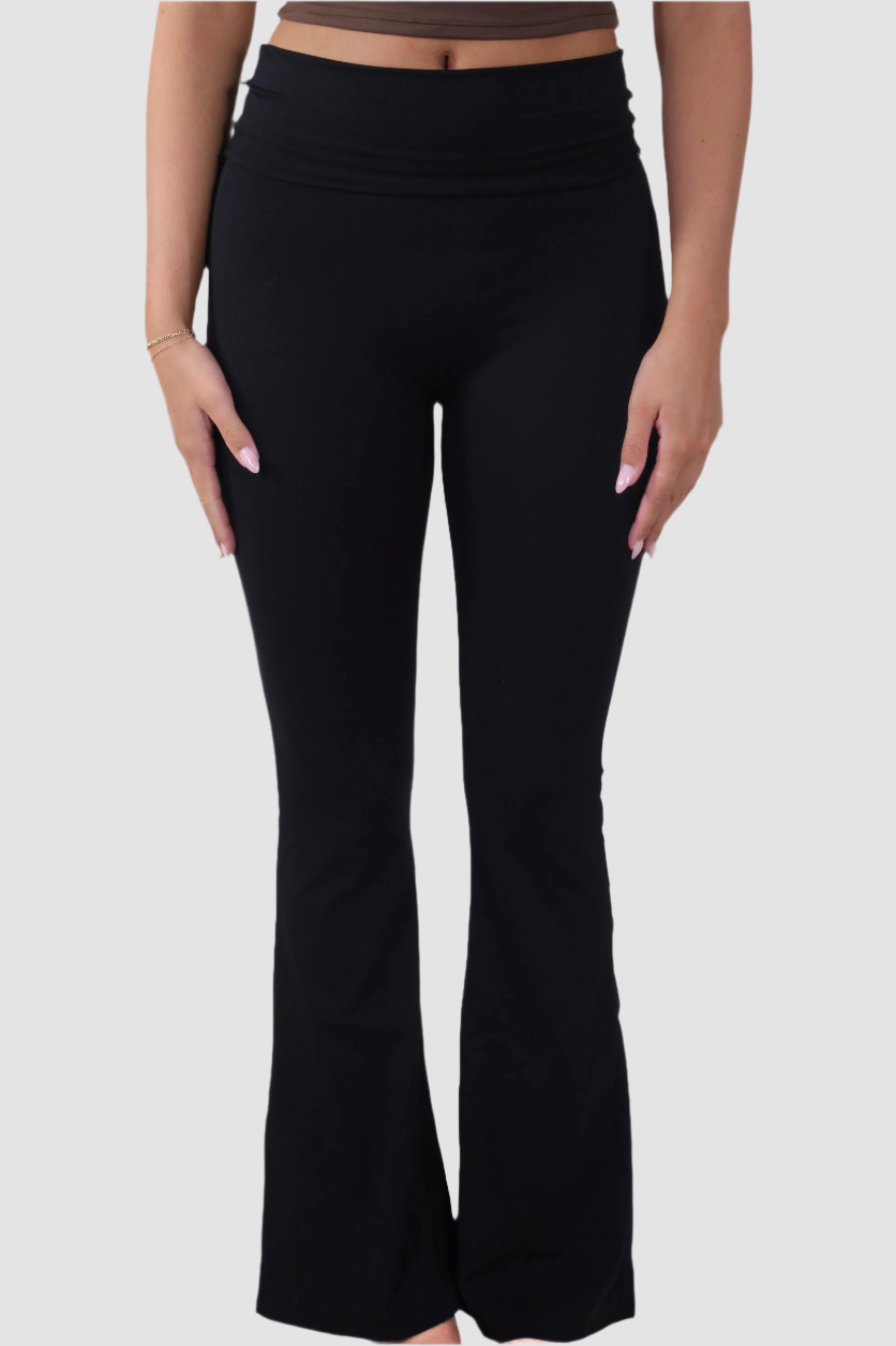 Front view of black Aivvia Athletics women’s flared yoga pants, high-waist design for comfort and flexibility.