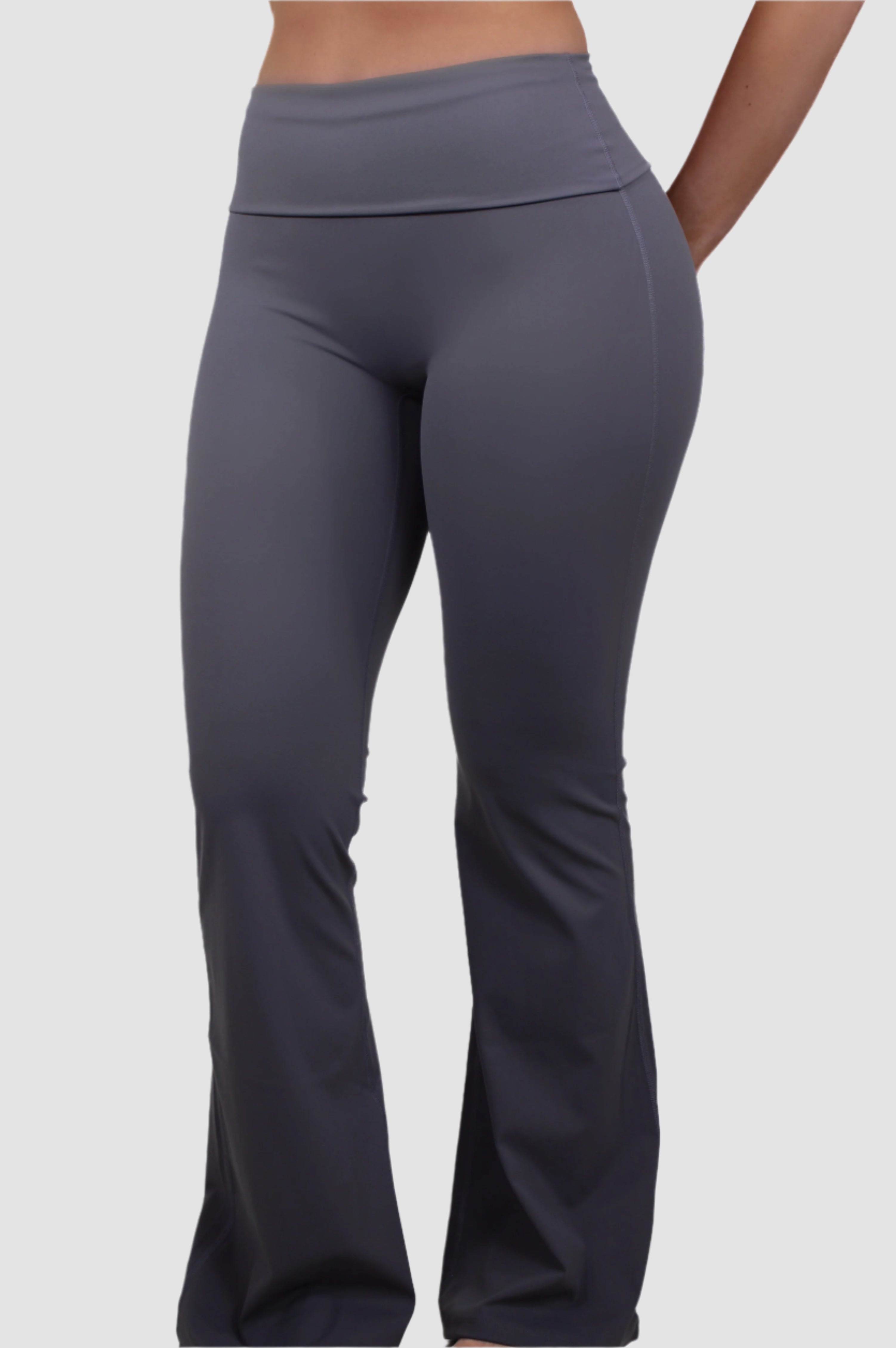 Front view of gray Aivvia Athletics women’s flared yoga pants with high-waist design for support and comfort.