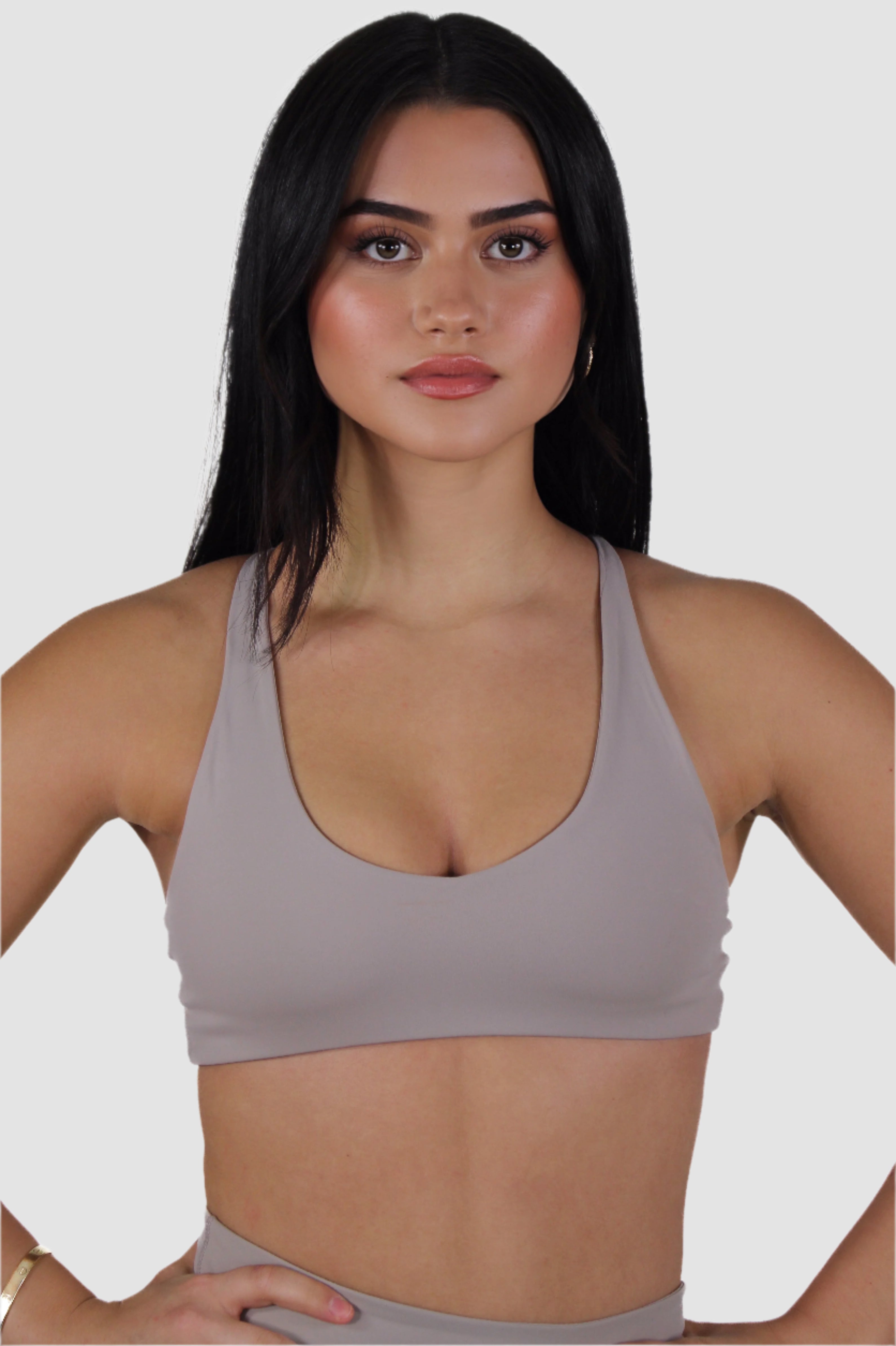 Taupe Aivvia Athletics sports bra; minimalist design with scoop neckline for gym and lifestyle wear.