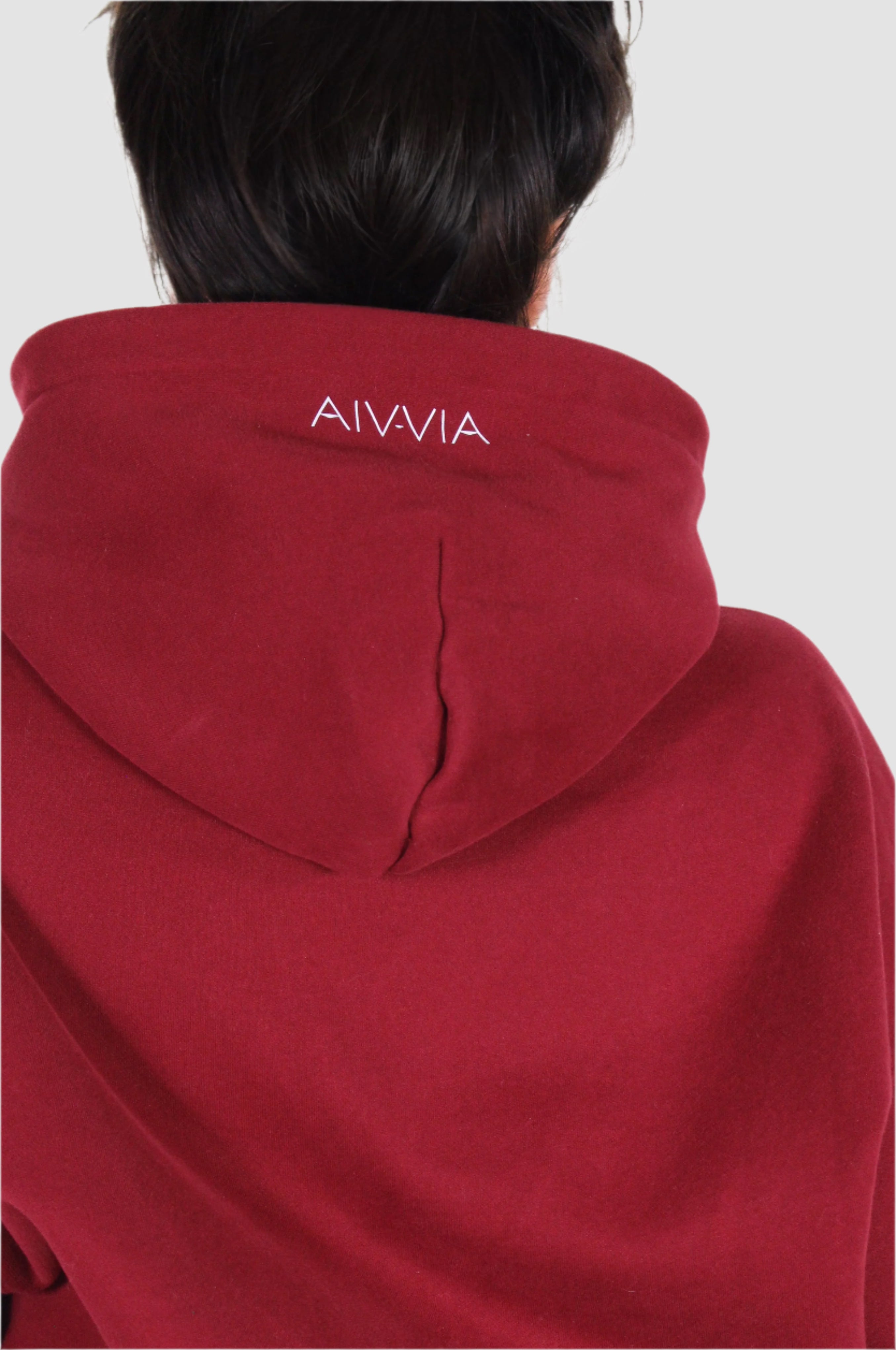 Close-up hood detail of Aivvia Athletics red hoodie, premium women’s sportswear design.